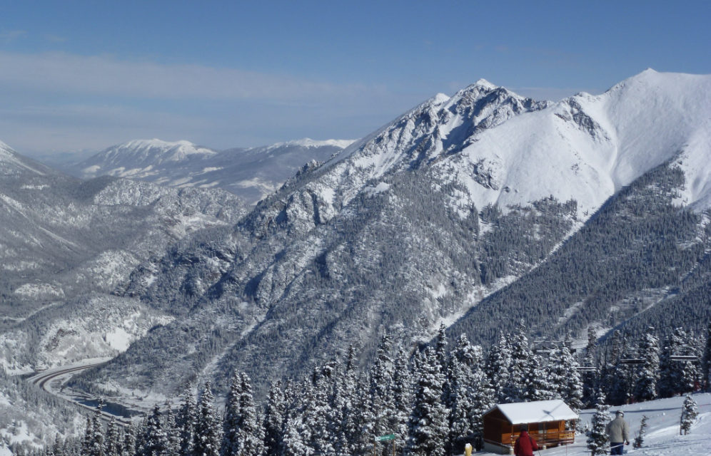 Snow-covered peaks above the Evergreen valley